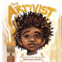 Picture of a young boy with a large afro holding a paintbrush. The words The Artivist is written behind his head. Text: #1 New York Times Bestselling Illustrator Nikkolas Smith.