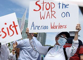 Protestors hit the streets over federal firings.