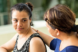 woman being comforted