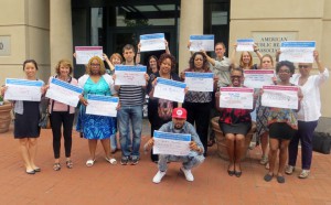 people holding gun violence prevention signs