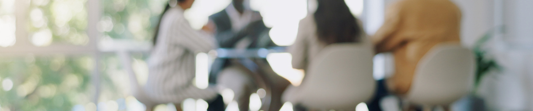 Blurry group of people at a table