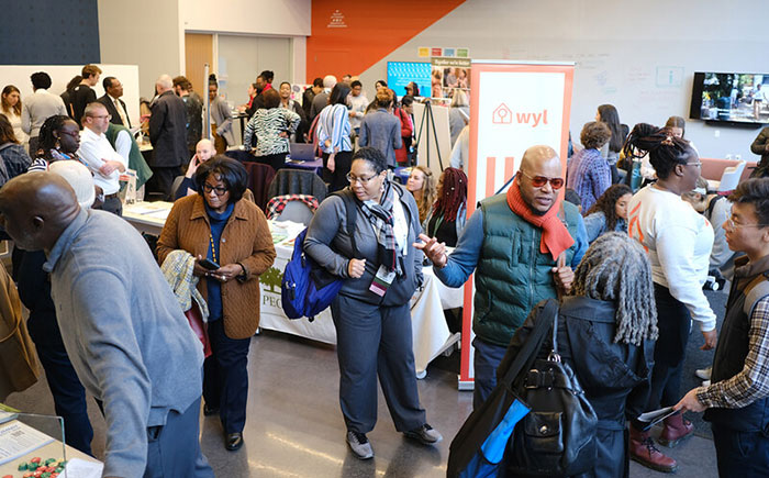 people looking at public health displays