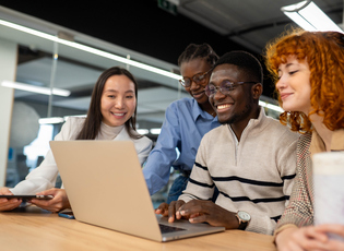 Colleagues discussing at work stock photo