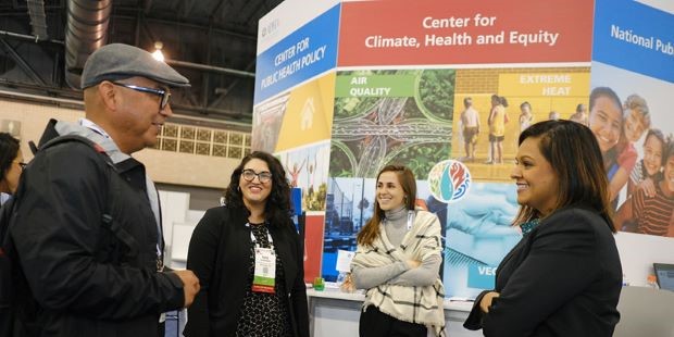 Attendees engaging at APHA Annual Meeting and Expo