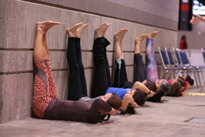 five people in yoga pose
