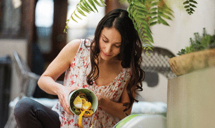 woman composting
