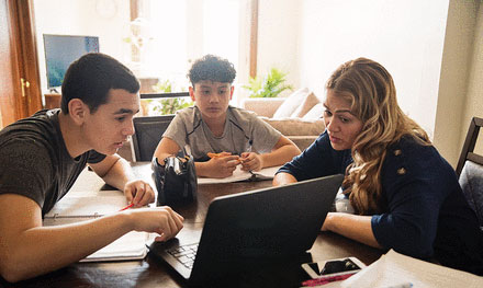 family around computer