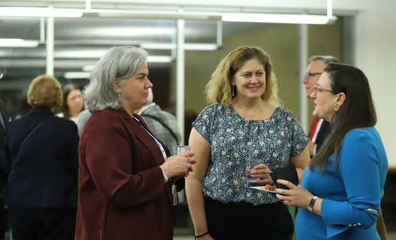 people having a conversation at a reception
