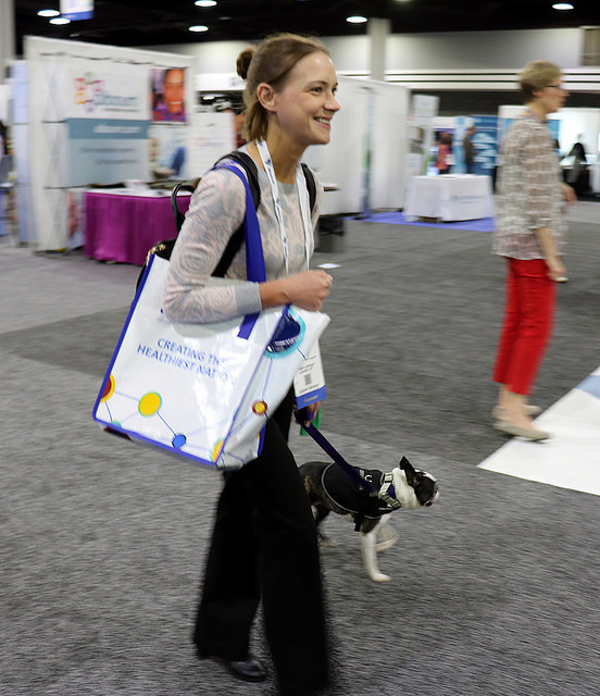 woman walking dog at Public Health Expo