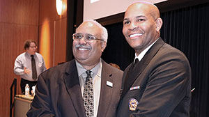 Georges Benjamin and Jerome Adams smiling