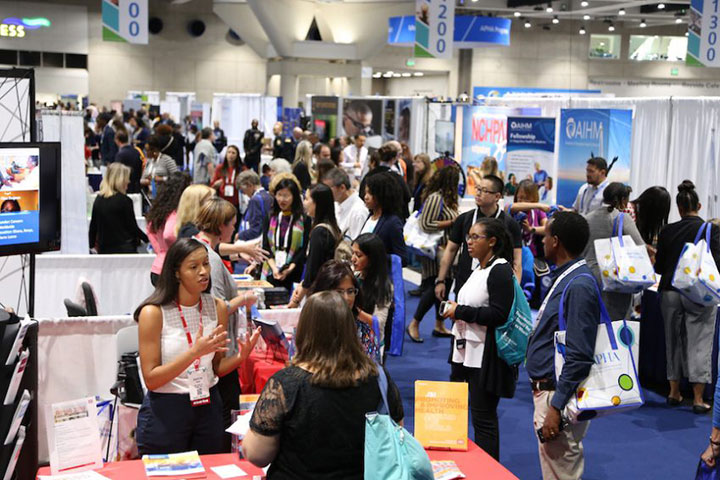 people exploring booths at the Public Health Expo