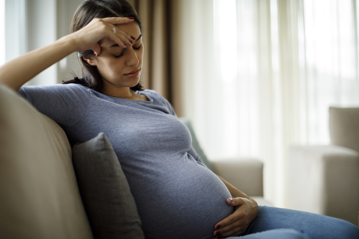 Maternal mental health pregnant woman looking sad
