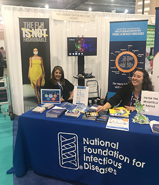 smiling women at Public Health Expo booth