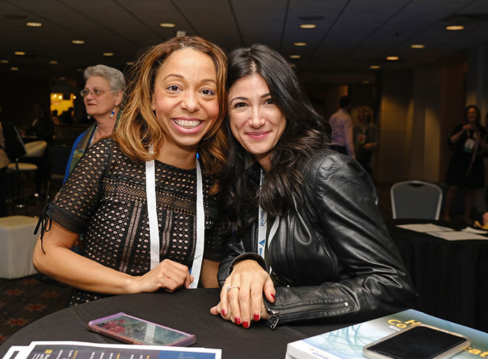 two smiling women