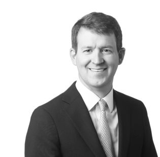 Headshot for Mike Reed in black and white