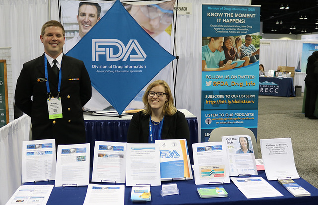 smiling man and woman at FDA Expo booth