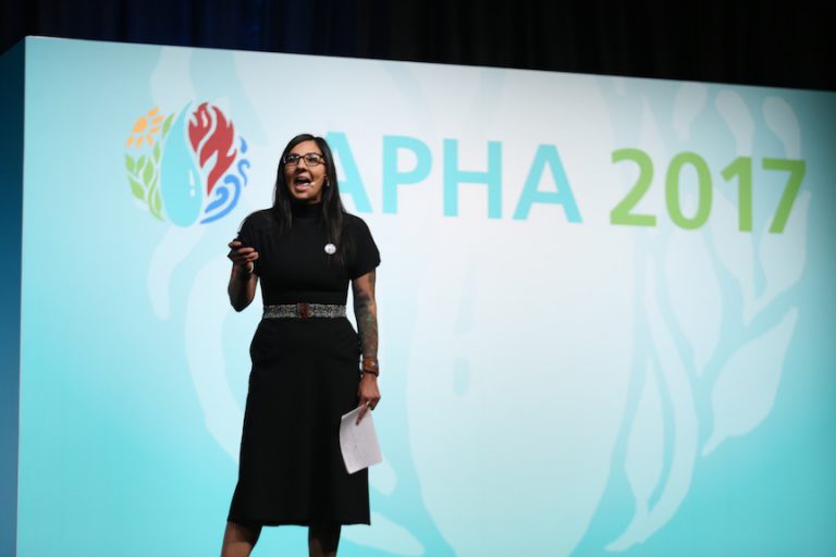Eriel Deranger speaking on stage