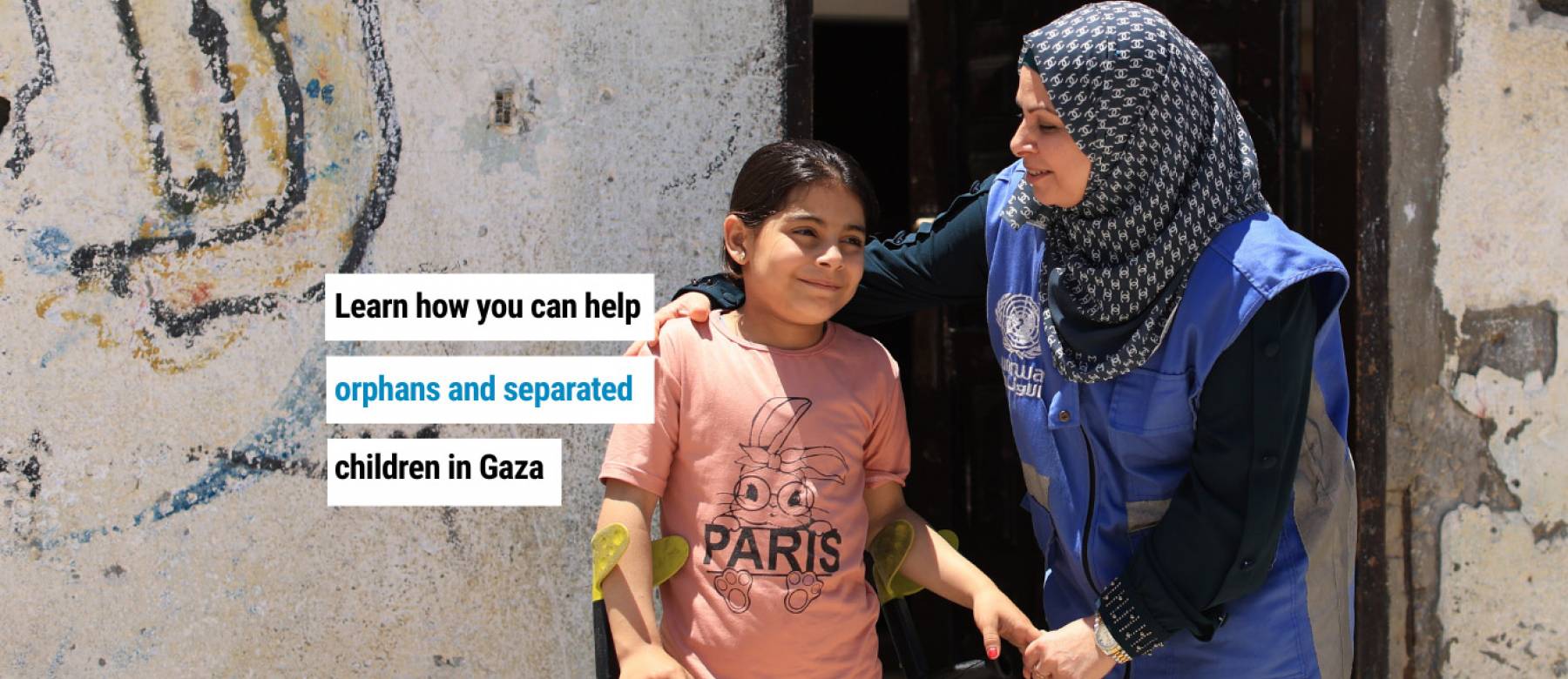 Image of a disabled child and an UNWRA employee embracing them with words that read learn how you can help orphans and separated children in Gaza. 