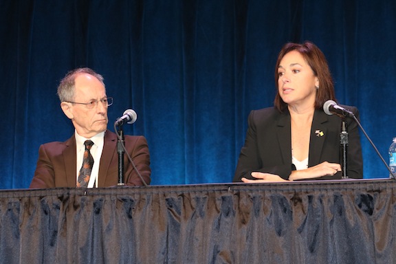 Michael Marmot and Karen DeSalvo on stage