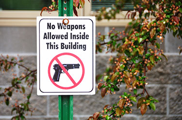 No Weapons Allowed Inside the Building sign