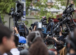 The press with cameras