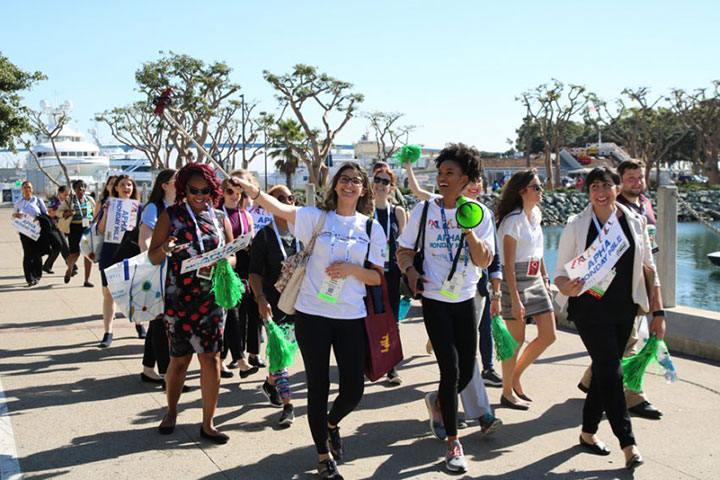 People walking outside San Diego Convention Center