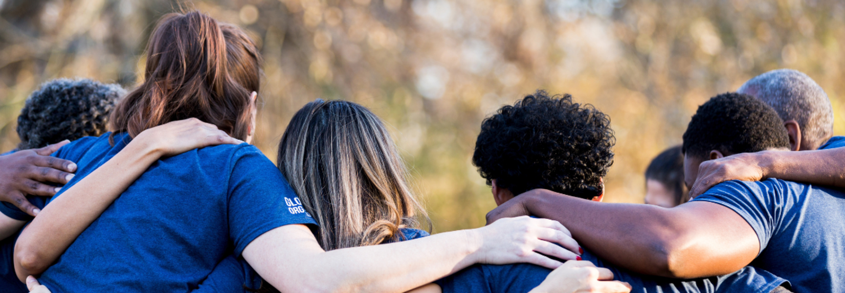 Group of people hugging 