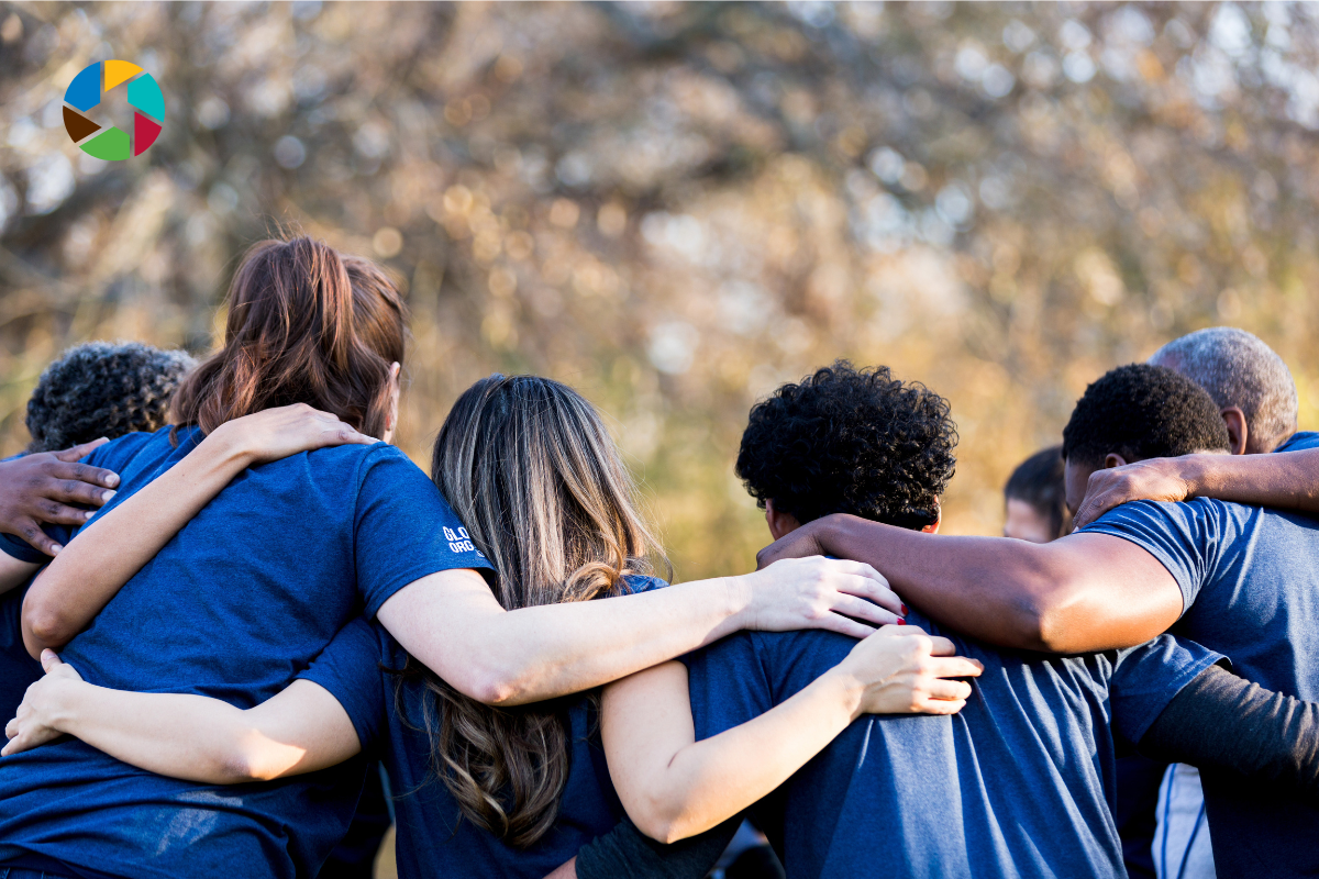 Group of people hugging 