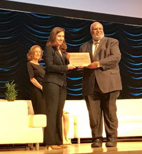 Georges Benjamin accepts the American Climate Leadership Award from ecoAmerica’s Rebecca Rehr and Leyla McCurdy