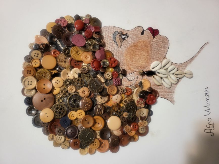 A hand-drawn image of a woman with buttons as hair and shells as an earring. At the bottom of the image, it says "afro woman."