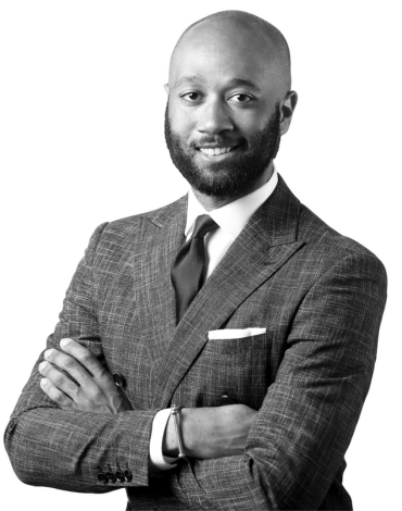 Hyma Moore headshot in black and white
