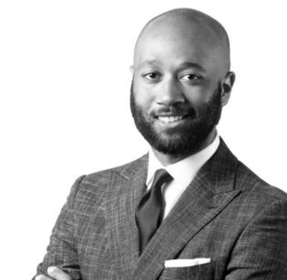 Hyma Moore headshot in black and white