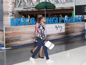 People walking past Mix N Mingle Lounge