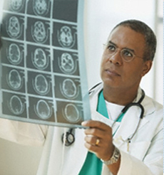 Doctor examining MRI scans